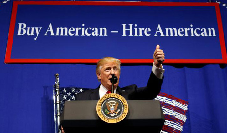Trump signs order to curb foreign workers
