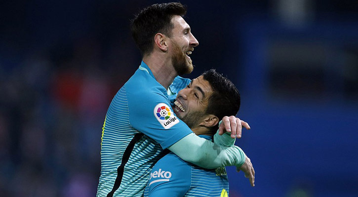 Messi, Suarez score in Barcelona win