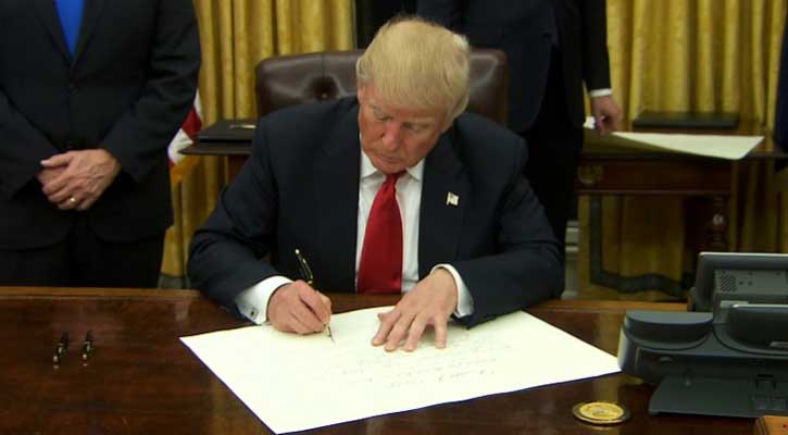 Trump begins overhaul as first executive orders signed