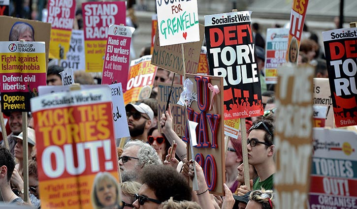 Thousands join anti-government protests in UK