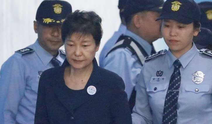Ex-South Korea president appears court in handcuffed