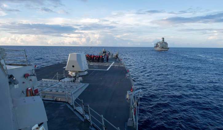 US warship challenges China's claims