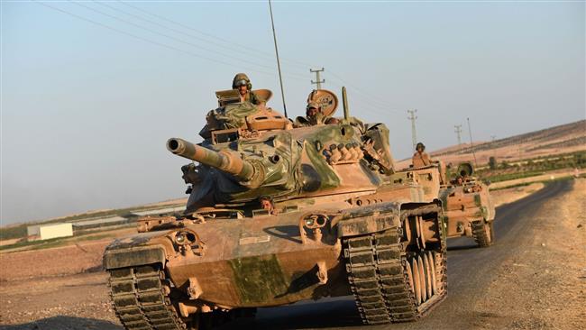 Turkey deploys 80 military vehicles near Syrian border