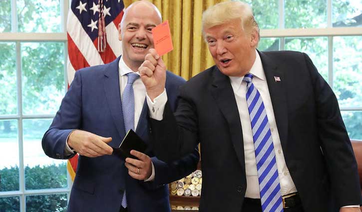 Trump shows media the red card