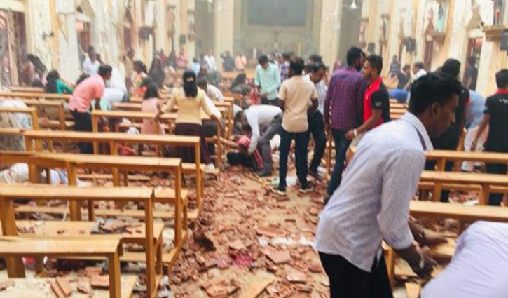 At least 138 dead as multiple blasts hit Sri Lanka churches