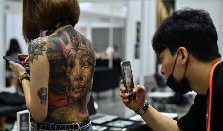 ‘Half naked’ tattoo show goes viral in Malaysia