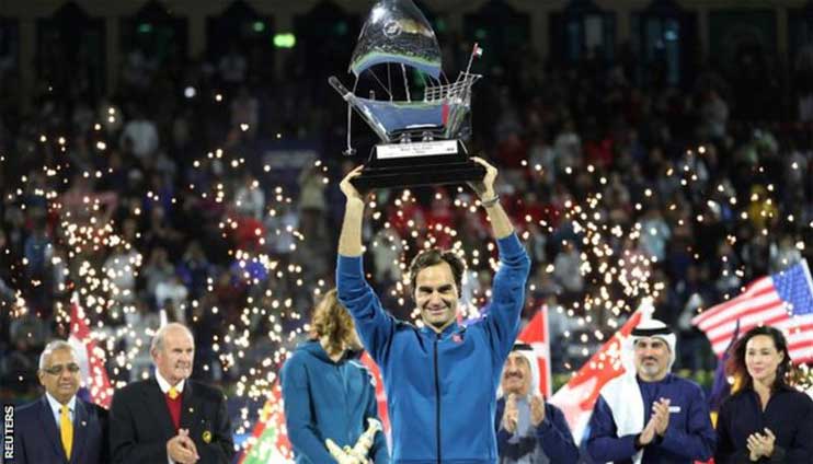 Roger Federer wins landmark 100th ATP title