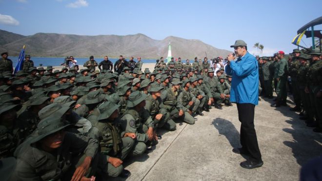 Venezuela crisis: Maduro defiant as pressure builds