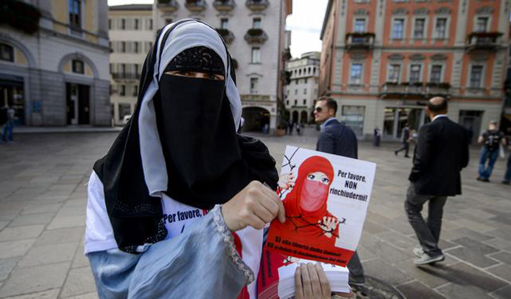 Swiss vote on `burqa ban`
