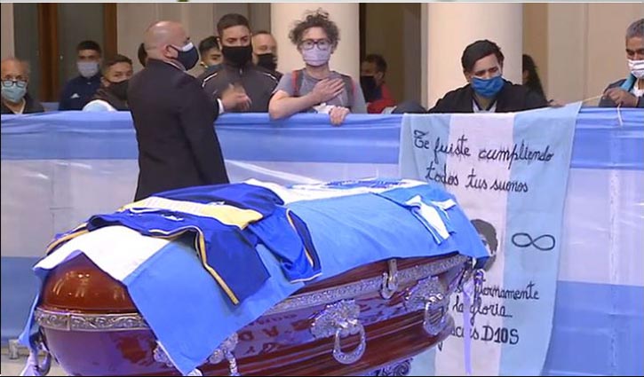 Maradona buried beside his parents