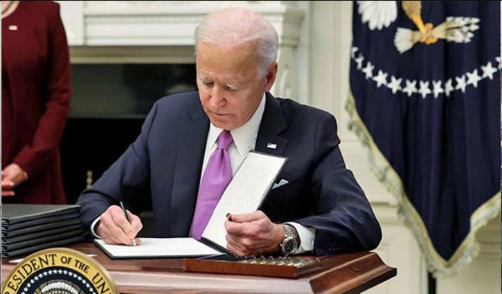 Biden signs 10 executive orders on second day