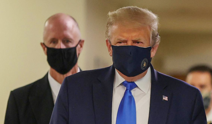 Trump wears mask for first time in public