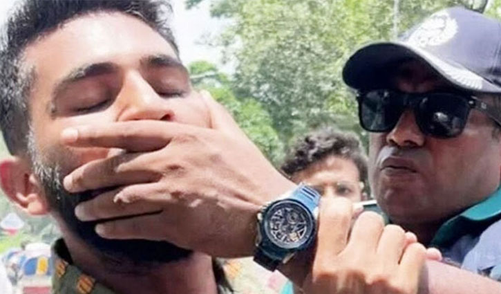 The policeman who grabbed the student's face was dismissed