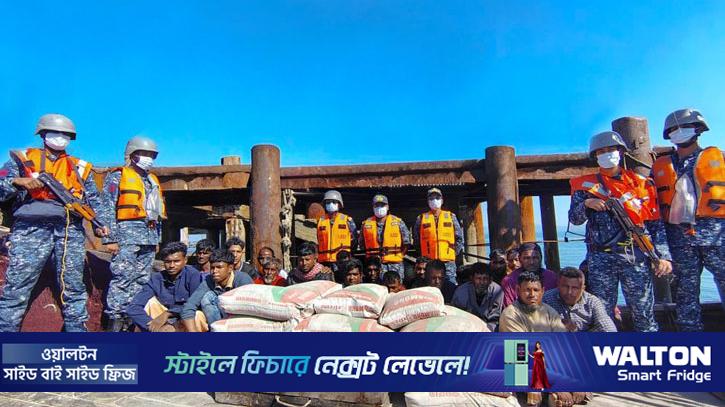 মিয়ানমারে পাচারকালে সিমেন্টবোঝাই দুই ট্রলারসহ আটক ২২