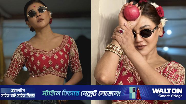 আপেল হাতে নজরকাড়া জয়া